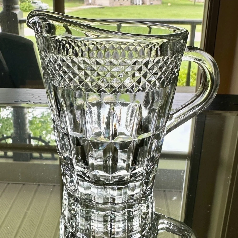 CLEAR PRESSED GLASS CREAMER. HAS COVETRO ITALY MARKED ON BOTTOM.